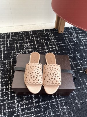Alaïa IN VIENNE SUEDE SLIDES BEIGE