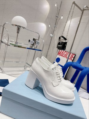 Prada Heeled Brushed leather lace-ups White Loafers