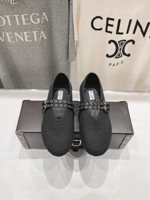 Alaïa BALLET FLATS IN PAPER STRAW BLACK