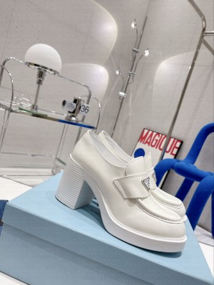 Prada high-heeled brushed leather Loafers white