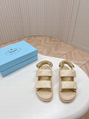 Prada Metal lettering logo Leather sandals 2024 Beige
