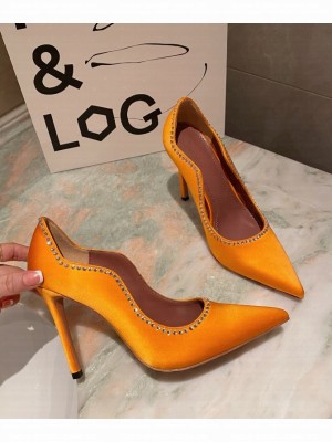 Amina Muaddi                                                                                        Romy pump orange