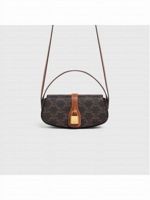 CELINE CLUTCH ON STRAP TABOU IN TRIOMPHE CANVAS AND CALFSKIN 101592 TAN