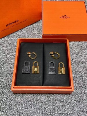 hermes lock earrings black 2021