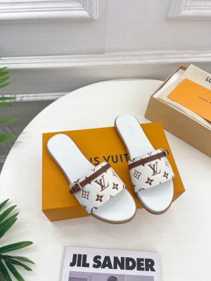 Louis Vuitton Grained Leather Flat Slide Sandals with Buckle 2023