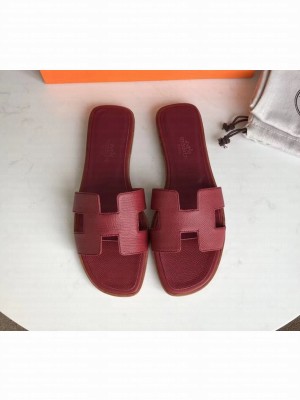 Hermes Oran Flat slippers in epsom leather burgundy with brown piping