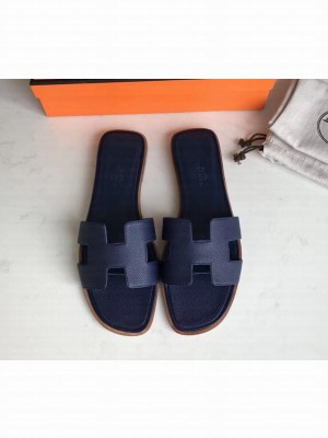 Hermes Oran Flat slippers in epsom leather dark blue with brown piping