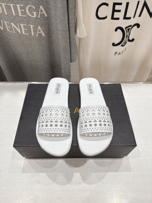 Alaïa IN VIENNE CALFSKIN SLIDES WHITE