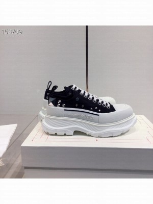 Alexander McQueen Tread Slick Low-Top Studded Sneakers Fall/Winter 2020 Collection, Black/White