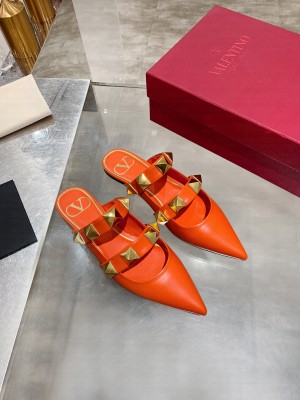 VALENTINO ROMAN STUD FLAT MULE IN CALFSKIN ORANGE