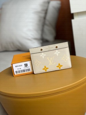 Louis Vuitton  Mini Pochette Accessories 12cm Monogram Empreinte Leather Spring/Summer 2021 Collection M80401, Cream/Saffron