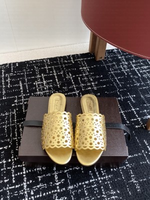 Alaïa IN VIENNE LAMBSKIN SLIDES GOLD