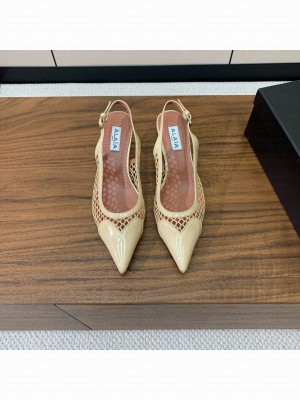 Alaïa LE CŒUR SLINGBACKS IN FISHNET YELLOW