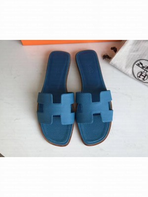 Hermes Oran Flat slippers in epsom leather indigo with brown piping