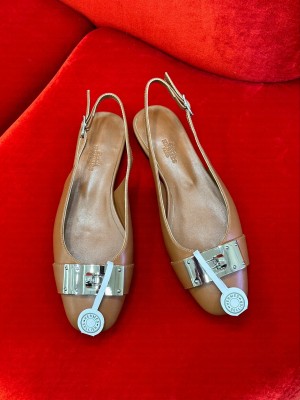 Hermes Innocente Slingback flat in goatskin brown
