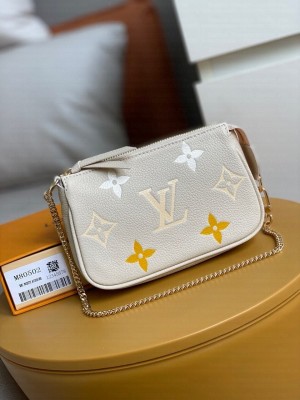 Louis Vuitton Mini Pochette Accessories 15cm Monogram Empreinte Leather Spring/Summer 2021 Collection M80502, Cream/Saffron