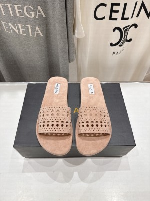 Alaïa IN VIENNE SUEDE SLIDES BEIGE