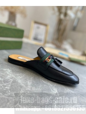GUCCI                                                                                        Women's slipper with tassels black