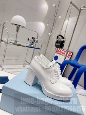Prada Heeled Brushed leather lace-ups White Loafers