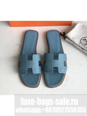Hermes Oran Flat slippers in epsom leather blue jean with brown piping
