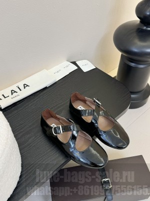 Alaïa CRISS CROSS BALLET FLATS IN BLACK PATENT CALFSKIN