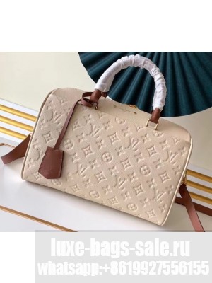 Louis Vuitton Monogram Empreinte Leather Speedy Bandouliere 30 Bag Creme