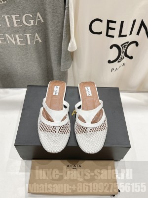 Alaïa INFRADITO FLAT MULES IN FISHNET AND LEATHER WHITE