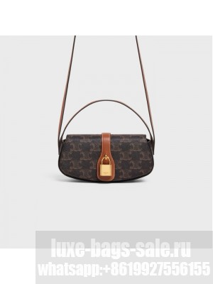 CELINE CLUTCH ON STRAP TABOU IN TRIOMPHE CANVAS AND CALFSKIN 101592 TAN