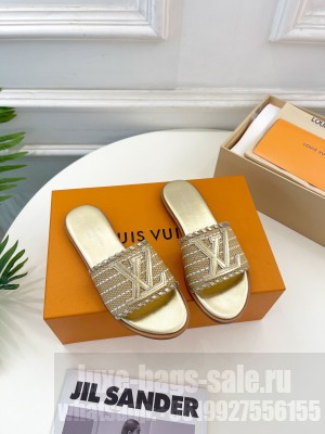 Louis Vuitton Starboard Flat Slide Sandal in LV Raffia and Leather 2023 Gold