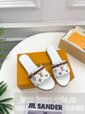 Louis Vuitton Grained Leather Flat Slide Sandals with Buckle 2023