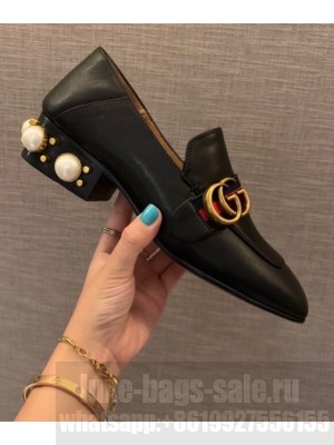 GUCCI                                                                                        Leather mid-heel loafer