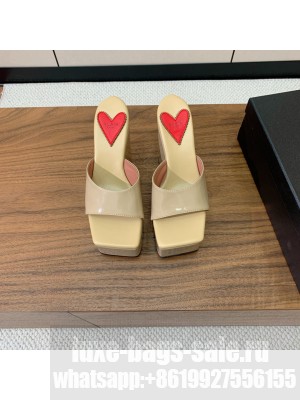 Alaïa WEDGE MULES IN PATENT LEATHER BEIGE