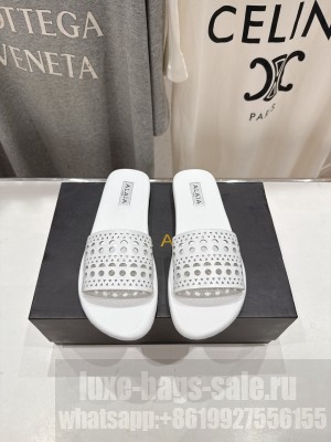 Alaïa IN VIENNE CALFSKIN SLIDES WHITE