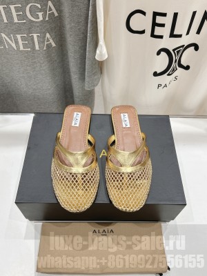 Alaïa INFRADITO FLAT MULES IN FISHNET AND LEATHER GOLD