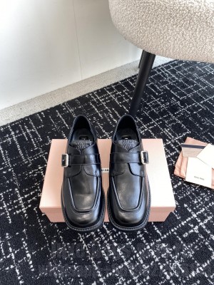 Miu Miu Leather brogue black Loafer