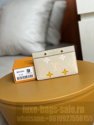 Louis Vuitton  Mini Pochette Accessories 12cm Monogram Empreinte Leather Spring/Summer 2021 Collection M80401, Cream/Saffron