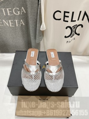 Alaïa INFRADITO FLAT MULES IN FISHNET AND LEATHER SILVER