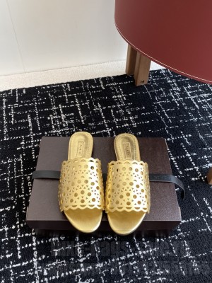 Alaïa IN VIENNE LAMBSKIN SLIDES GOLD