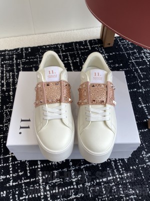 Valentino Garavani Rockstud Untitled sneaker in white calfskin 056 2025