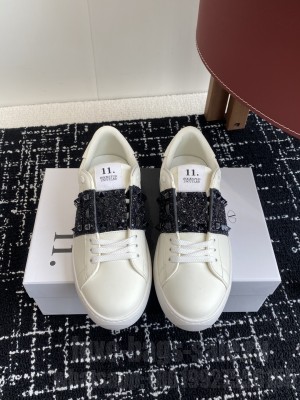 Valentino Garavani Rockstud Untitled sneaker in white calfskin 037 2025