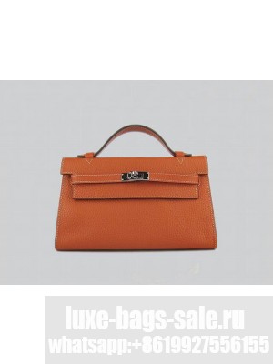 HERMES KELLY 22 CALFSKIN LEATHER CLUTCH BAG IN ORANGE 