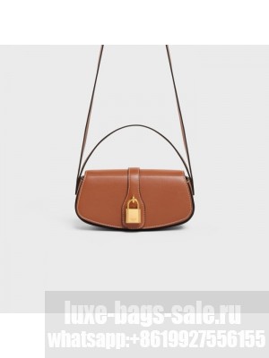 CELINE CLUTCH ON STRAP TABOU IN SUPPLE CALFSKIN 101592 TAN